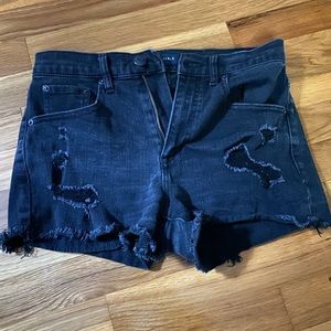 black ripped jean shorts